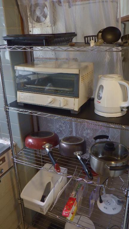 Cosmos Guesthouse Iya Valleyにあるキッチンまたは簡易キッチン