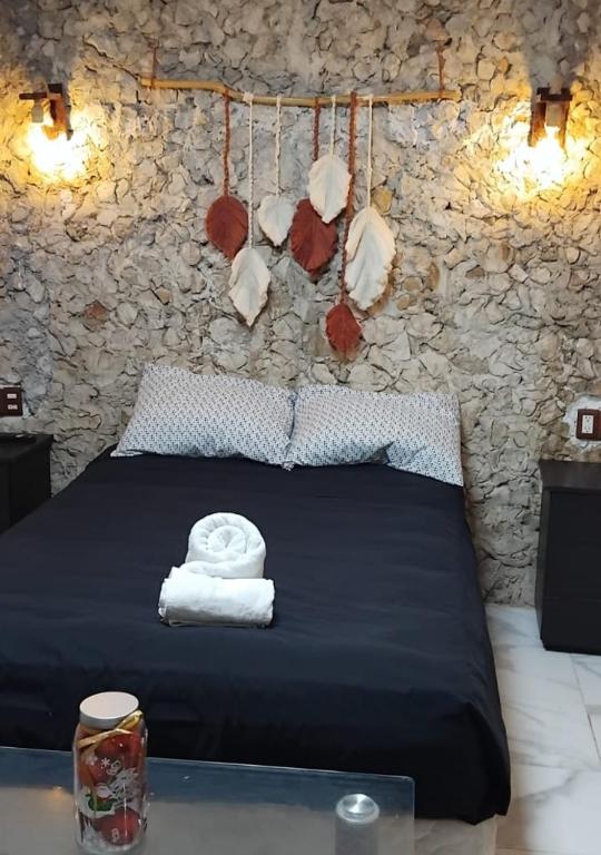 Postel nebo postele na pokoji v ubytování Casa "Los Jarochos" sencilla