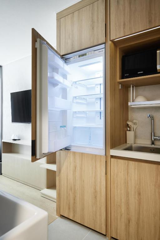 Kuchyň nebo kuchyňský kout v ubytování Homes Stay Myeongdong