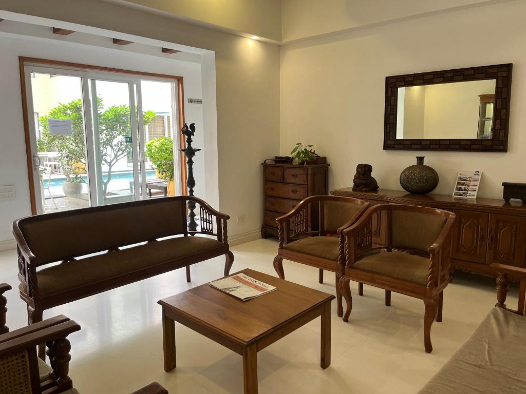 Posezení v ubytování Maroma Suites ECR