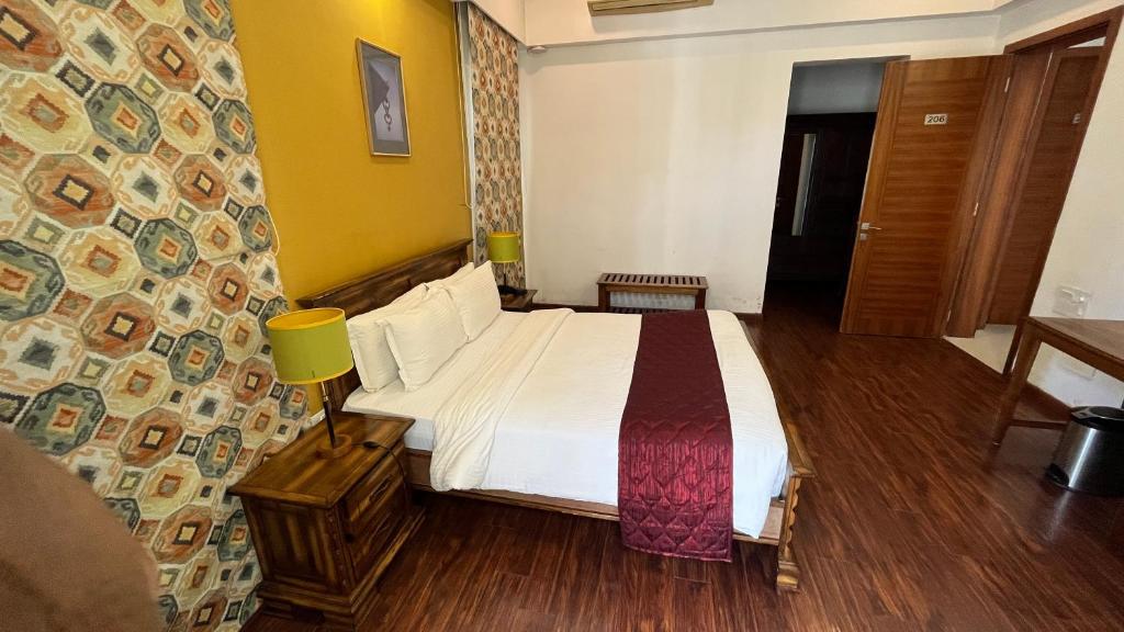 Postel nebo postele na pokoji v ubytování Maroma Suites ECR