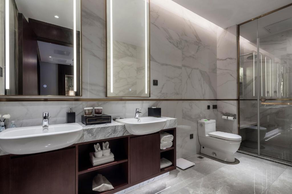 Koupelna v ubytování Xinghuacun Hotel
