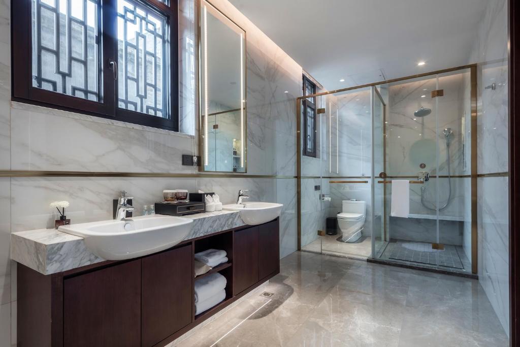 Koupelna v ubytování Xinghuacun Hotel