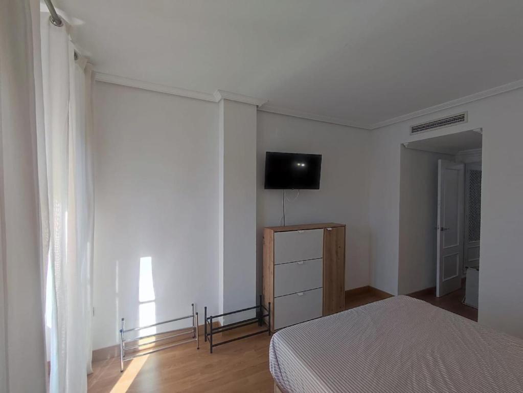 Televízia a/alebo spoločenská miestnosť v ubytovaní Luz de la Bahía San Fernando Cádiz