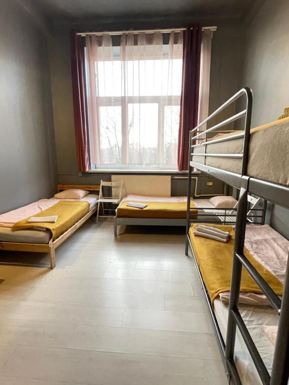 Postel nebo postele na pokoji v ubytování Pokoje Gościnne FRESCO