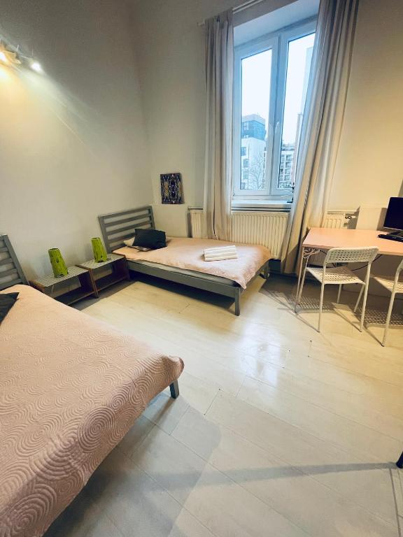Postel nebo postele na pokoji v ubytování Pokoje Gościnne FRESCO