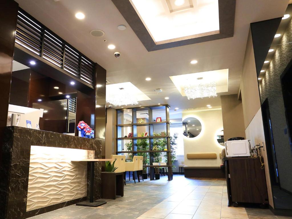 TV a/nebo společenská místnost v ubytování RE Hotel 谷町9丁目2