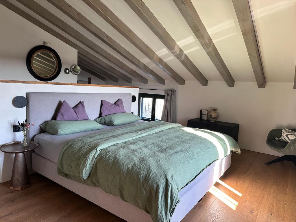 Ένα ή περισσότερα κρεβάτια σε δωμάτιο στο Ca Nova Agriturismo