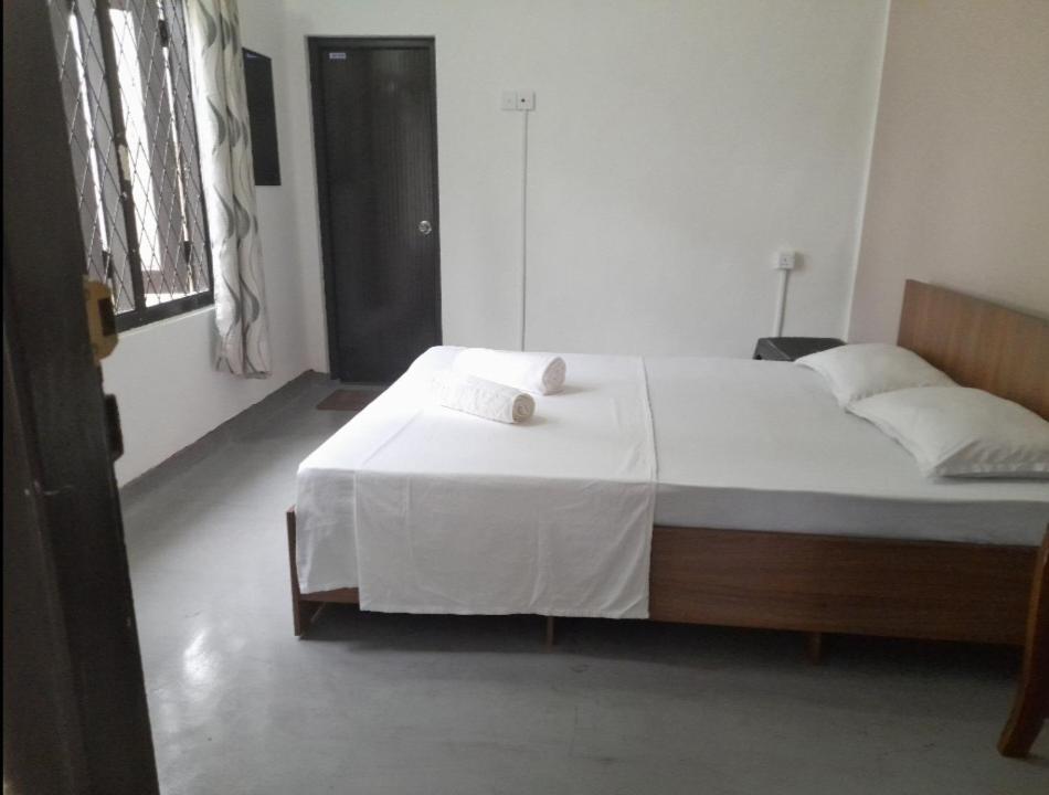 Postel nebo postele na pokoji v ubytování Gloria Cottage Non AC