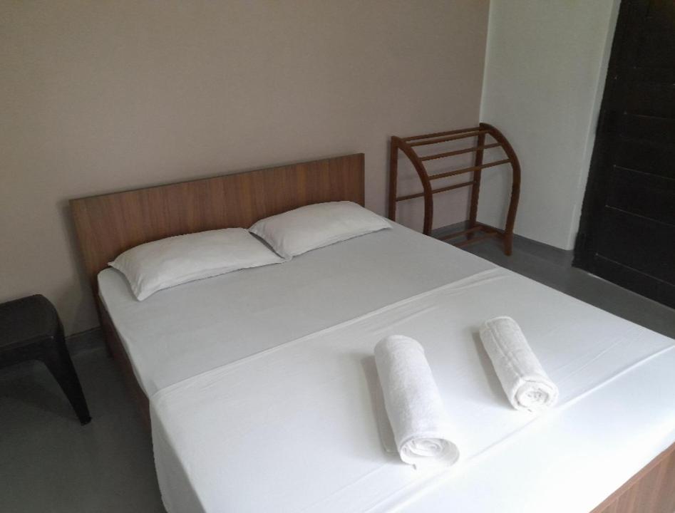 Postel nebo postele na pokoji v ubytování Gloria Cottage Non AC