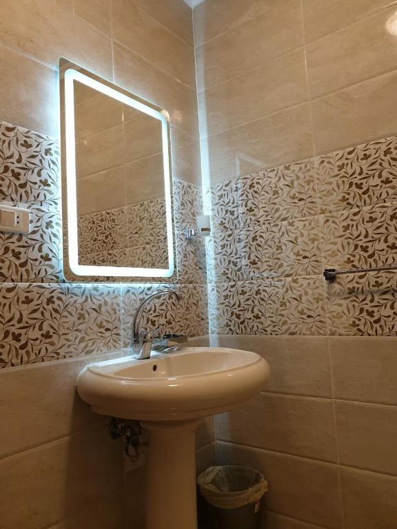 Koupelna v ubytování كورنيش سدي بشر برج طابا Sidi pishr