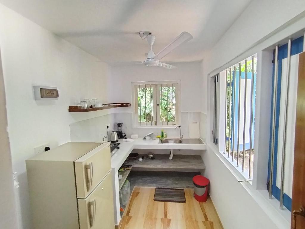 Postel nebo postele na pokoji v ubytování White Villa - Homestay