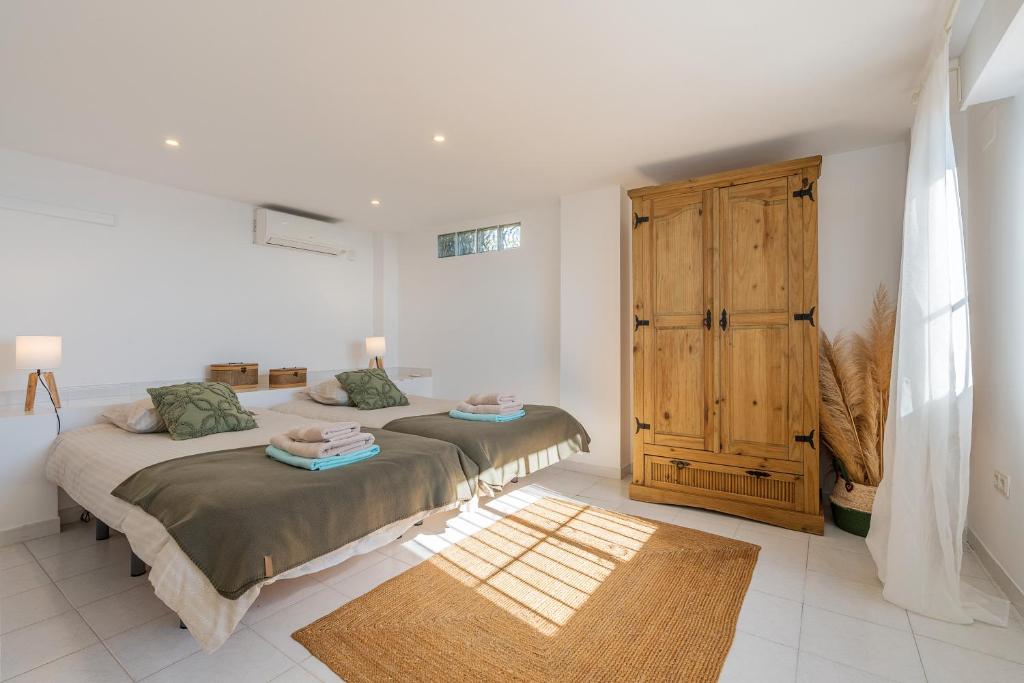 Posteľ alebo postele v izbe v ubytovaní Casa Romantica
