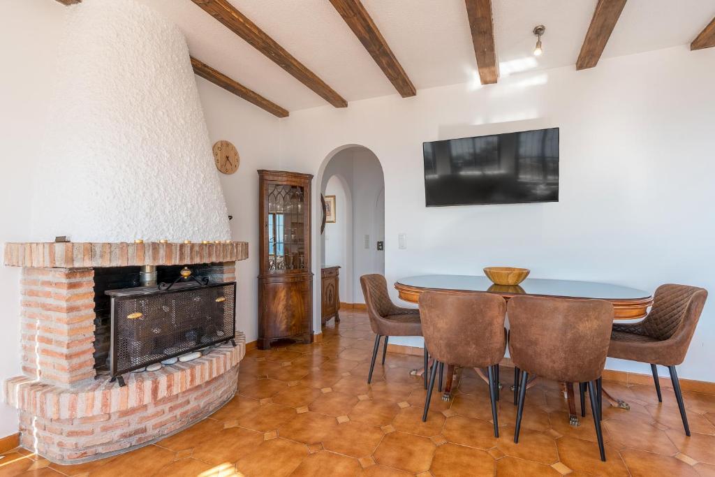 Televízia a/alebo spoločenská miestnosť v ubytovaní Casa Romantica