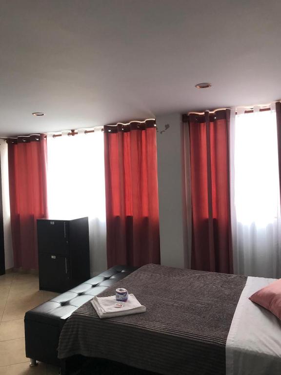 TV a/nebo společenská místnost v ubytování Destino Nómada Calle 11 n 1-38