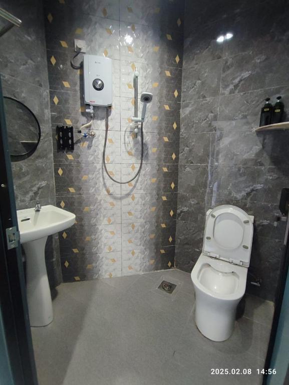 Koupelna v ubytování MUSANG ONG HOTEL
