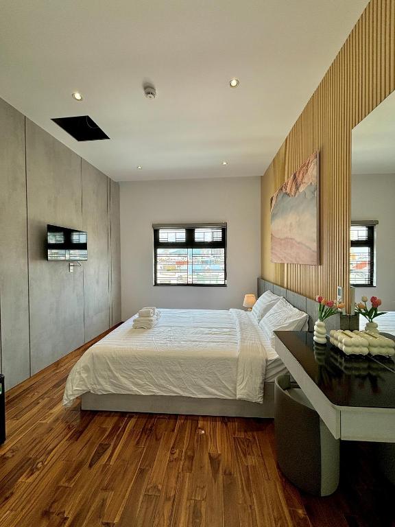 Postel nebo postele na pokoji v ubytování CEVA Hotel & Apartment Danang