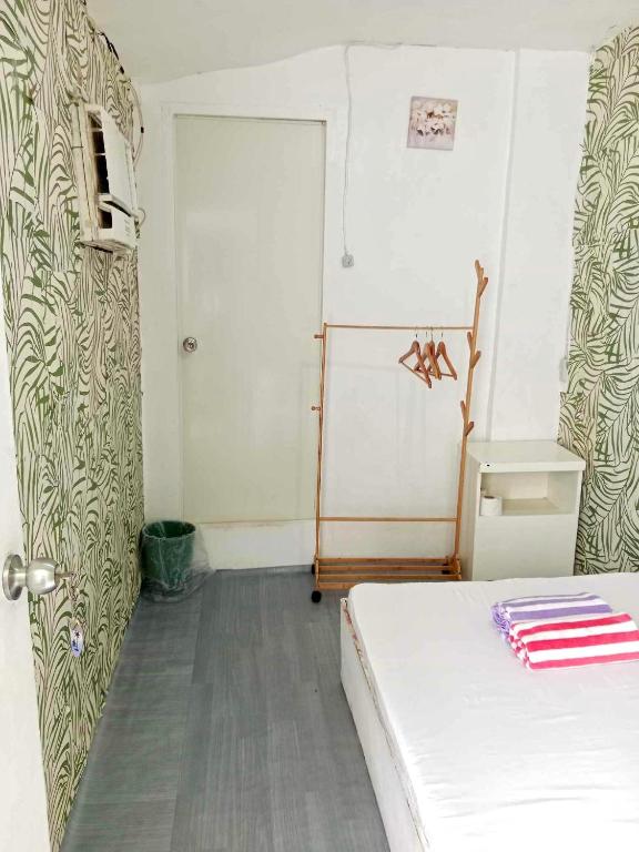 Voodi või voodid majutusasutuse Pearls Z Apartelle toas