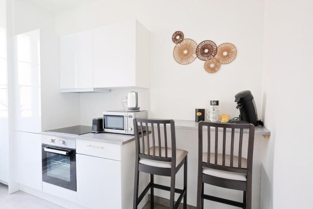 Kuchyň nebo kuchyňský kout v ubytování Appartement 2 pieces
