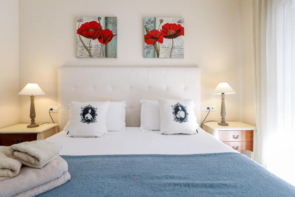Posteľ alebo postele v izbe v ubytovaní San Pedro beachside apartment
