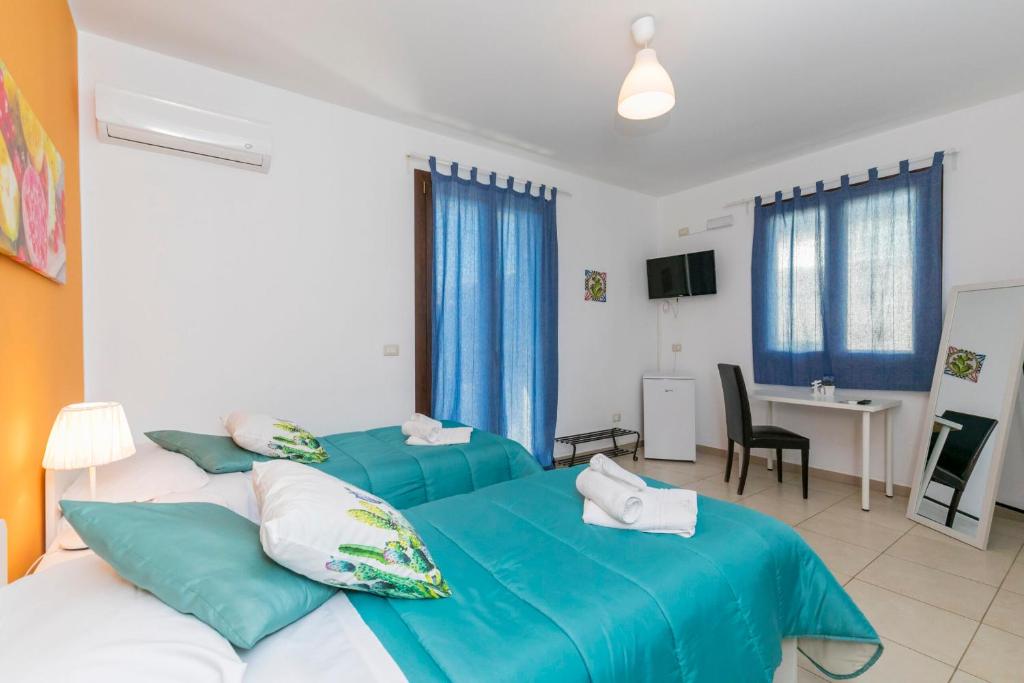 Postel nebo postele na pokoji v ubytování TERRA MIA