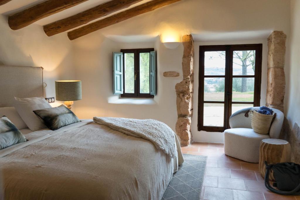 A bed or beds in a room at Reserva Rotana Golf Resort