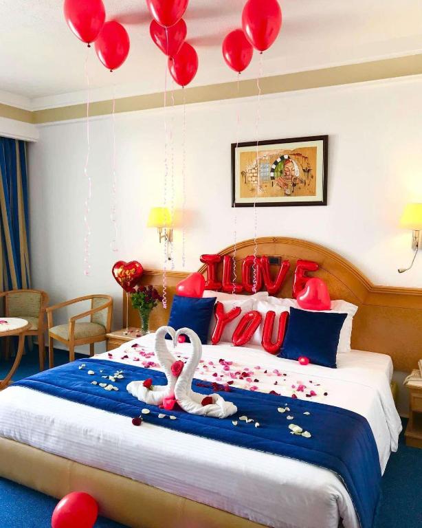 Postel nebo postele na pokoji v ubytování Mahdia Palace Thalasso