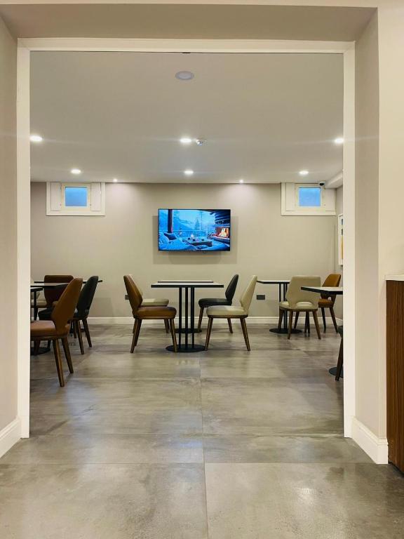 TV a/nebo společenská místnost v ubytování Howard House Hotel