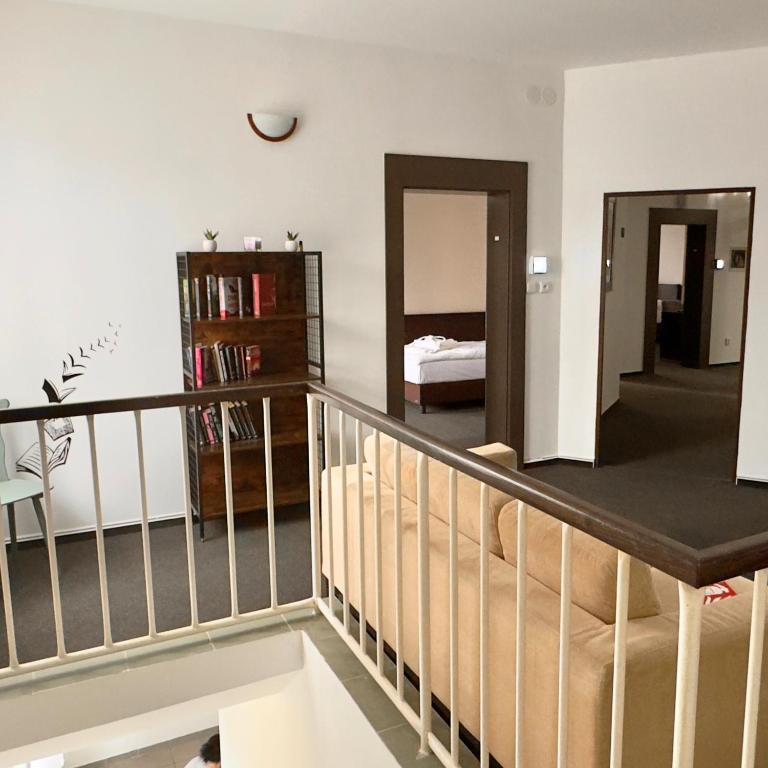 Postel nebo postele na pokoji v ubytování Hotel Zelený dům