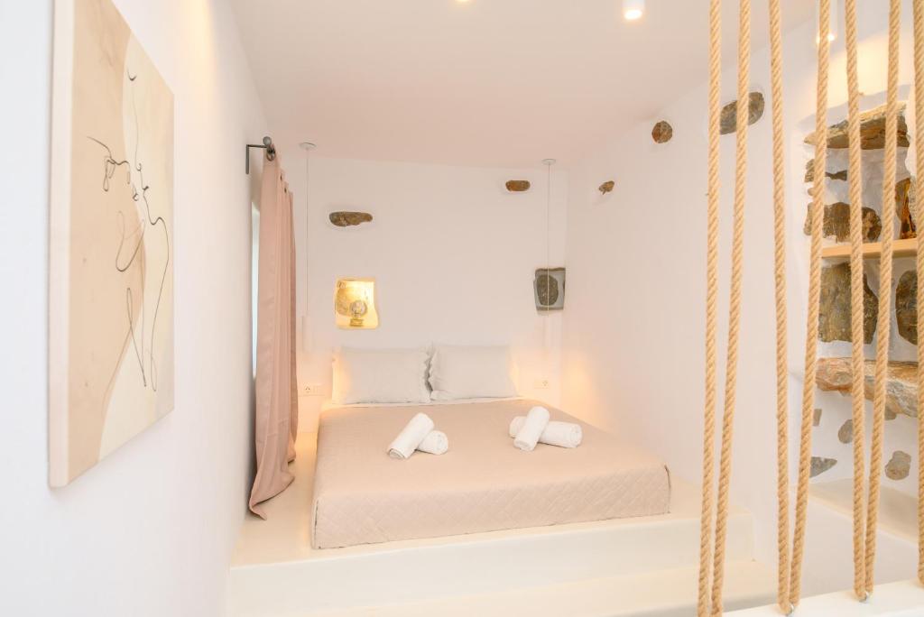 Łóżko lub łóżka w pokoju w obiekcie Idothea guest house
