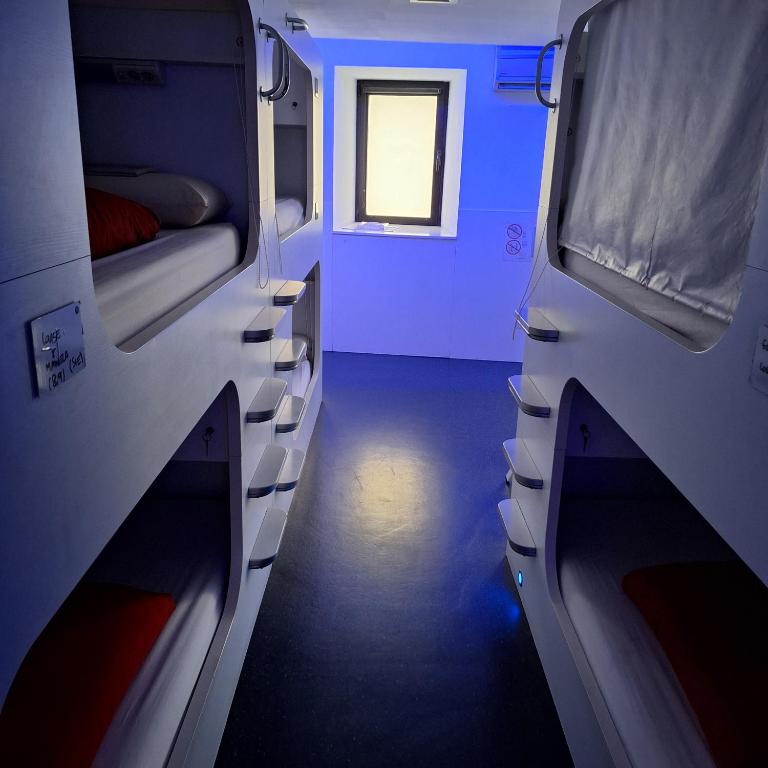 Postel nebo postele na pokoji v ubytování Hostel Casa Ibarrola