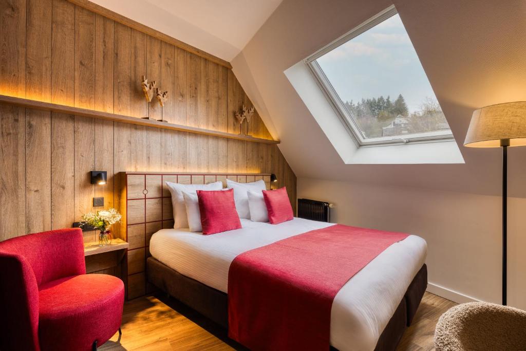 Postel nebo postele na pokoji v ubytování Hotel du Commerce