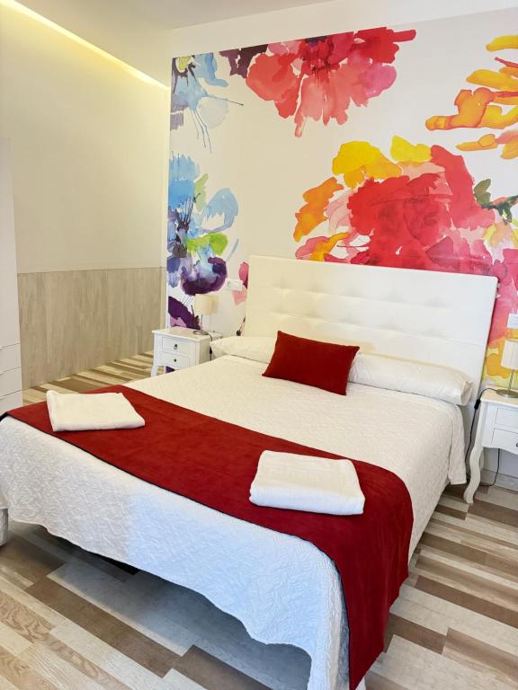 Postel nebo postele na pokoji v ubytování Casa Jardín El Colmenar