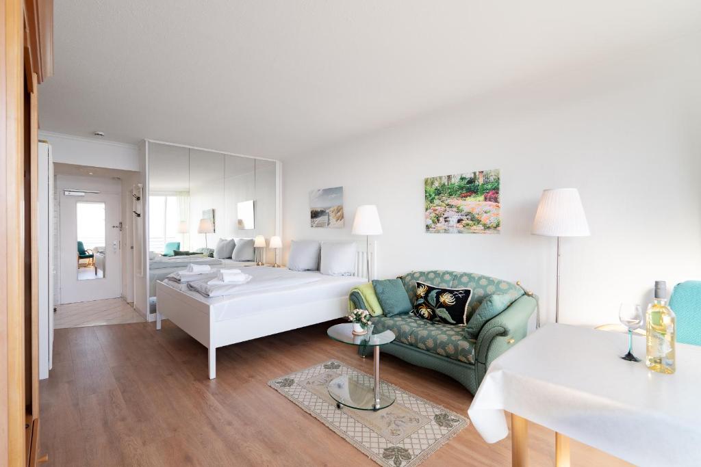 Postel nebo postele na pokoji v ubytování Ferienwohnung Meerblick App 805