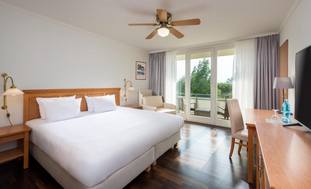 TV a/nebo společenská místnost v ubytování Precise Resort Rügen - Hotel & SPLASH Erlebniswelt