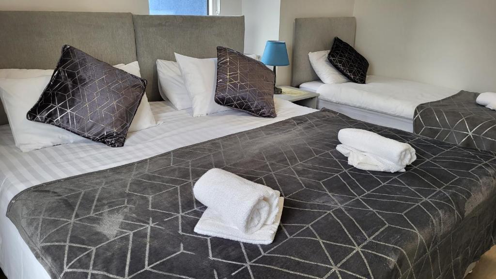 Letto o letti in una camera di Trivia House