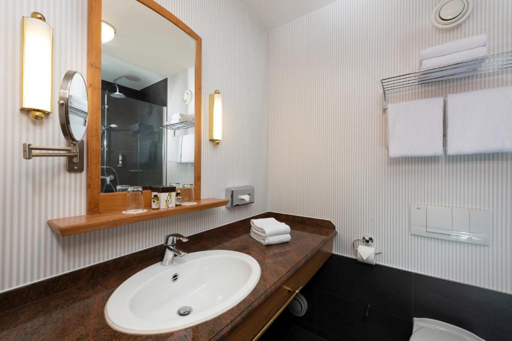 Koupelna v ubytování Precise Resort Rügen - Hotel & SPLASH Erlebniswelt