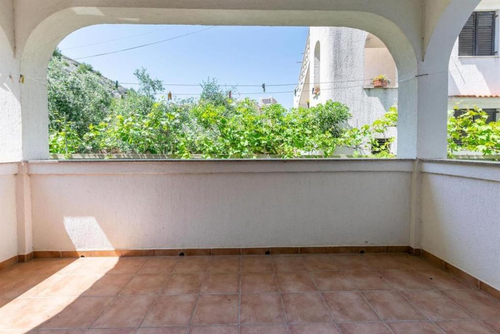 Balkón nebo terasa v ubytování Beachfront Apartments Lopar (4419)