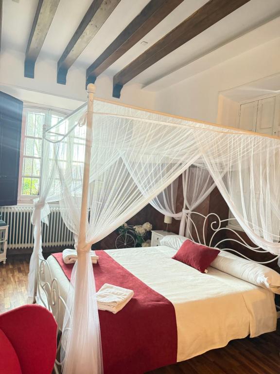 Postel nebo postele na pokoji v ubytování Casa Jardín El Colmenar