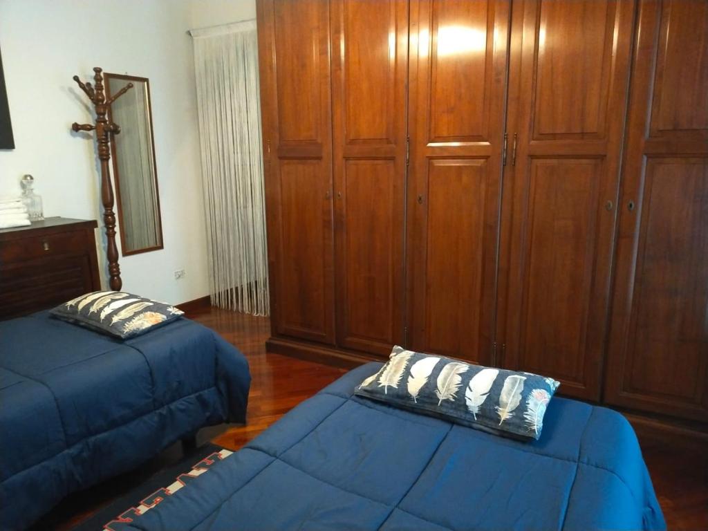 Postel nebo postele na pokoji v ubytování La tua casa meravigliosa con giardino