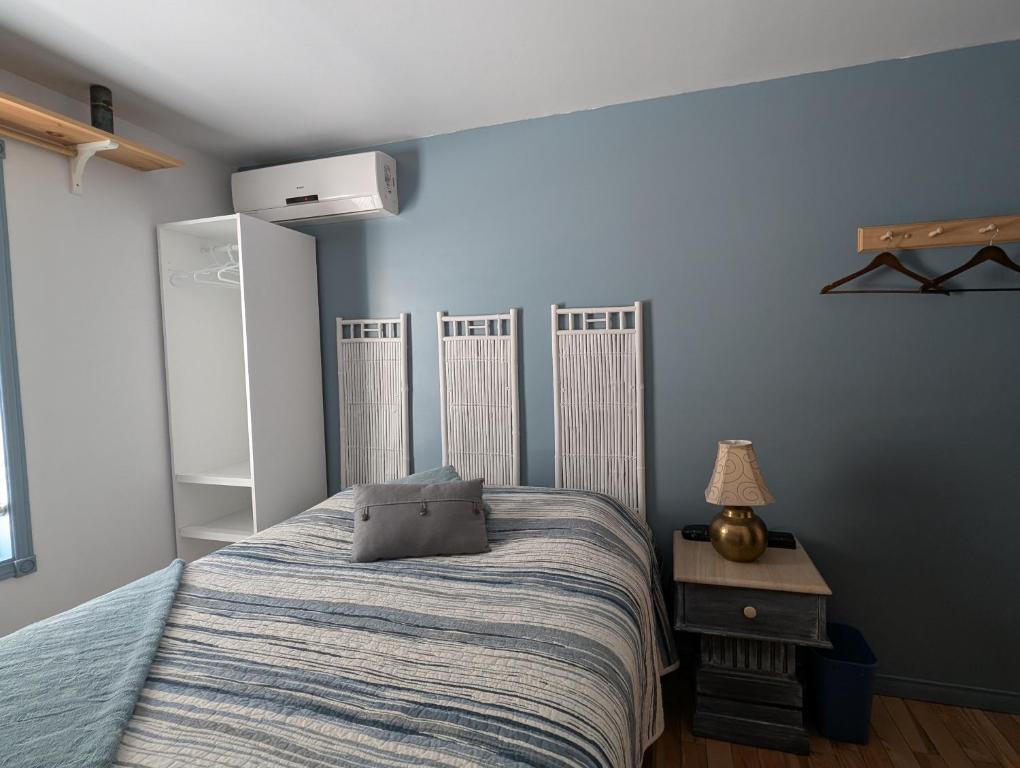 Postel nebo postele na pokoji v ubytování Au Saut Du Lit