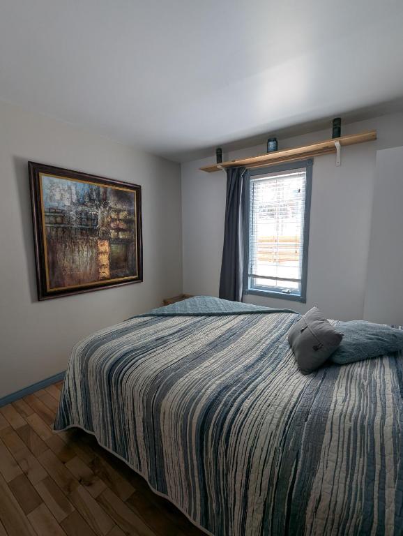 Postel nebo postele na pokoji v ubytování Au Saut Du Lit
