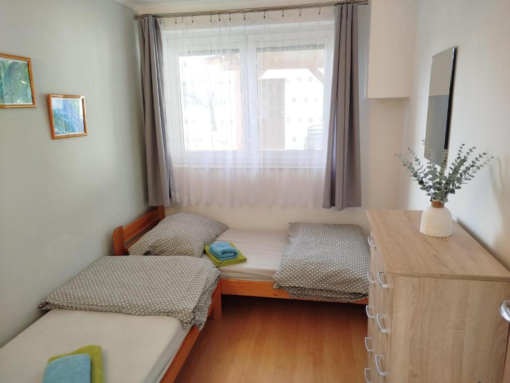 Postel nebo postele na pokoji v ubytování Ubytování Prušánky