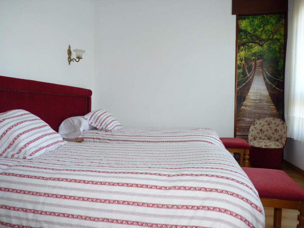 Postel nebo postele na pokoji v ubytování Hotel España