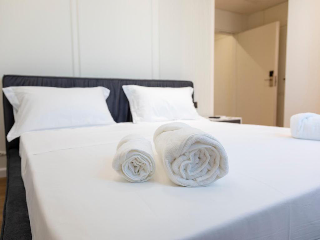 Postel nebo postele na pokoji v ubytování Adore Boutique Hotel