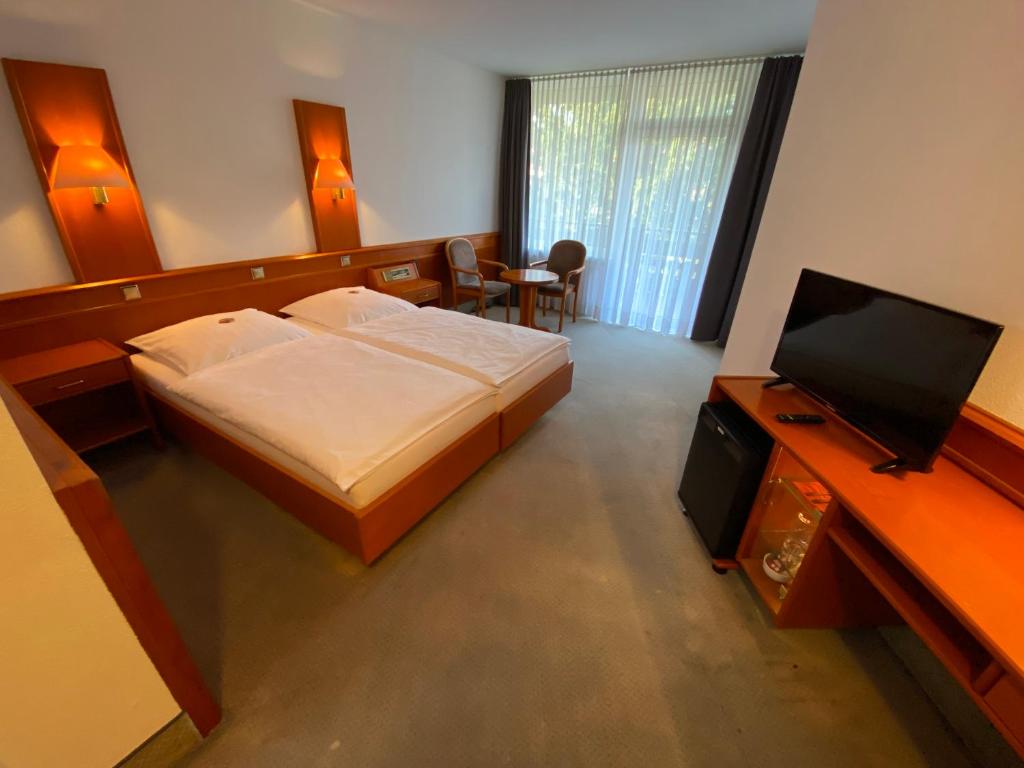 TV a/nebo společenská místnost v ubytování Adamidis Hotel