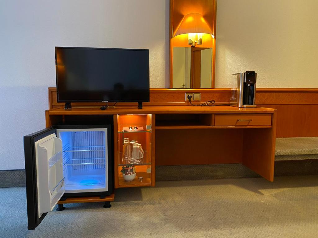 TV a/nebo společenská místnost v ubytování Adamidis Hotel