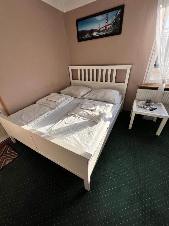 Postel nebo postele na pokoji v ubytování Noclegi AirportPark