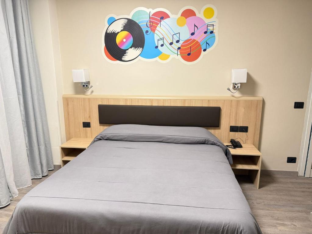 Posteľ alebo postele v izbe v ubytovaní Hotel Esperia