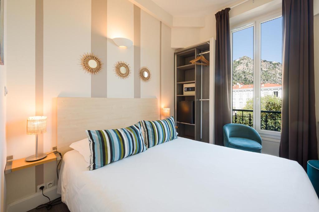 Postel nebo postele na pokoji v ubytování Hotel Select